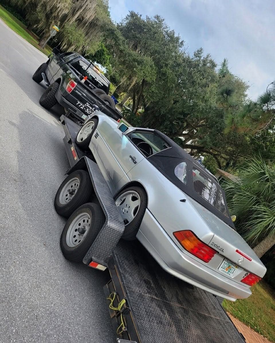 Silver Mercedes-Benz 500SL convertible on a Hook & Book trailer